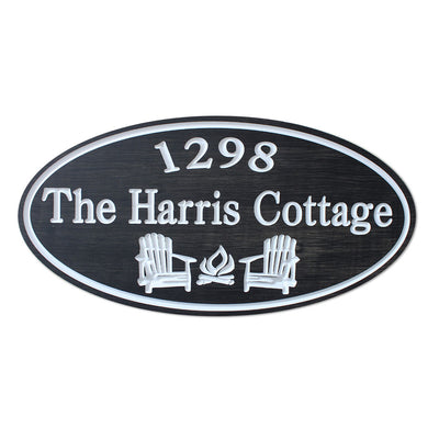 Cottage Sign with Adirondack Chairs and Fire